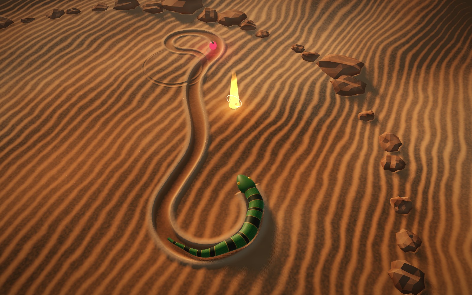 A green banded snake curls across sunlit desert sand, its groove fading behind it, beside a glowing golden gem.